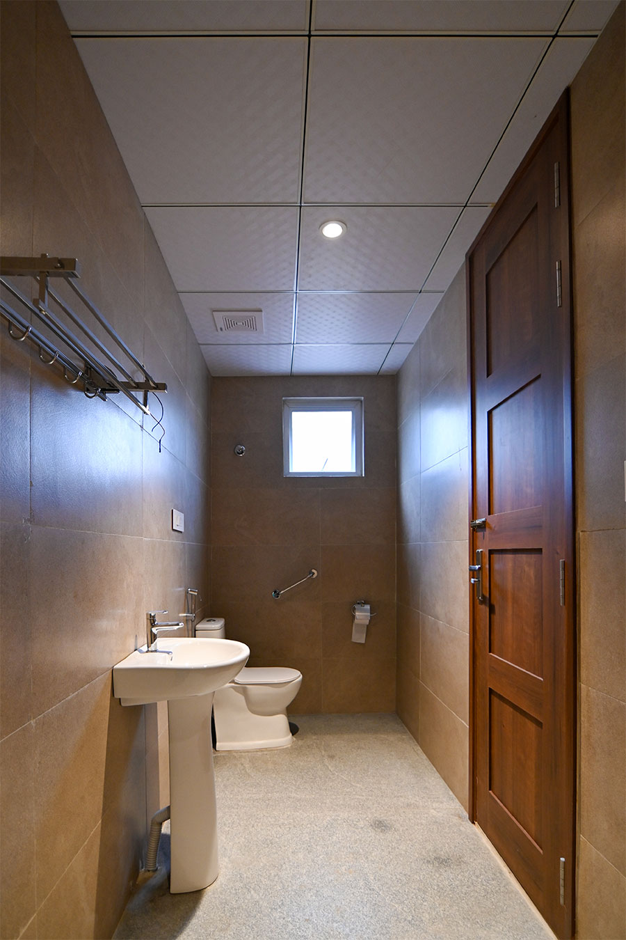 Clean modern restrooms with marble tiles