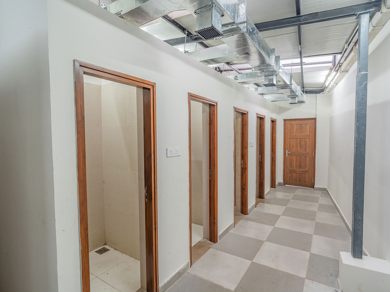 Clean modern restrooms with marble tiles